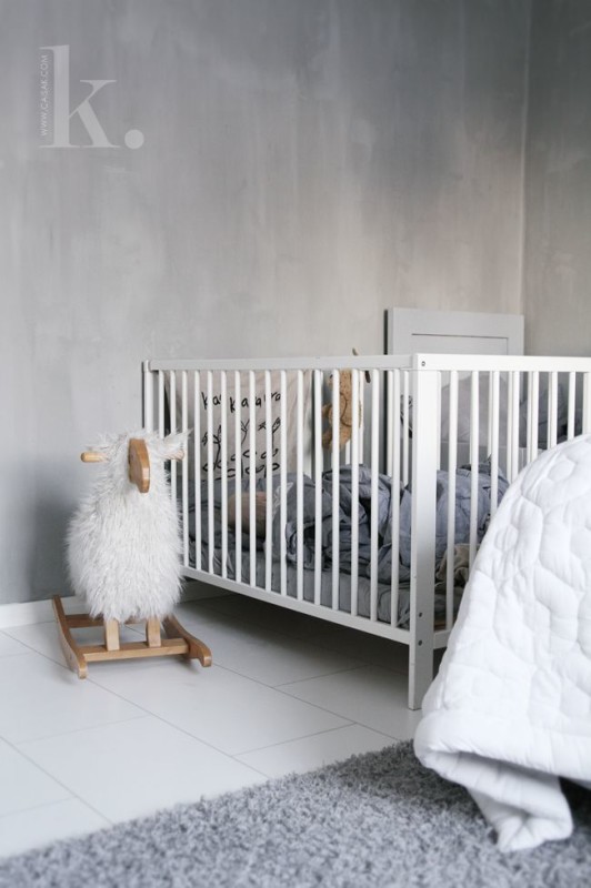 Dormitorio infantil de estilo nórdico decorado en gris