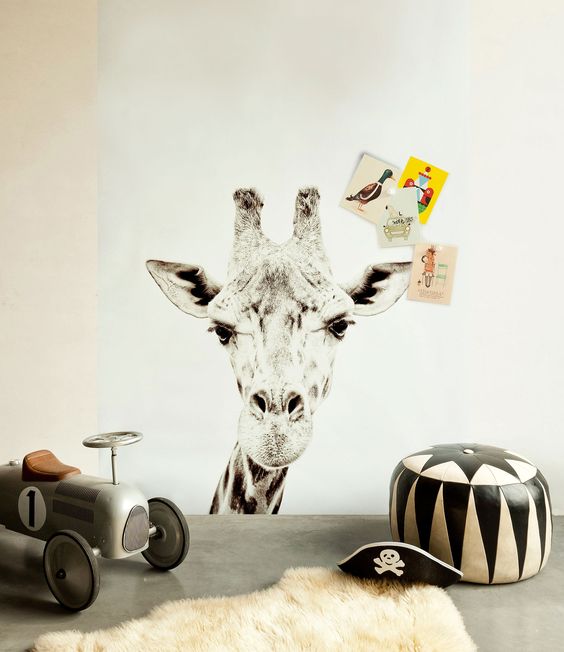 Decorar con papel pintado un dormitorio infantil con estampados de animales