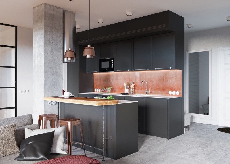 Claves_para_crear_contrastes_de_color_en_la_decoración_espacio_salón_black-kitchen-with-copper-backsplash-min